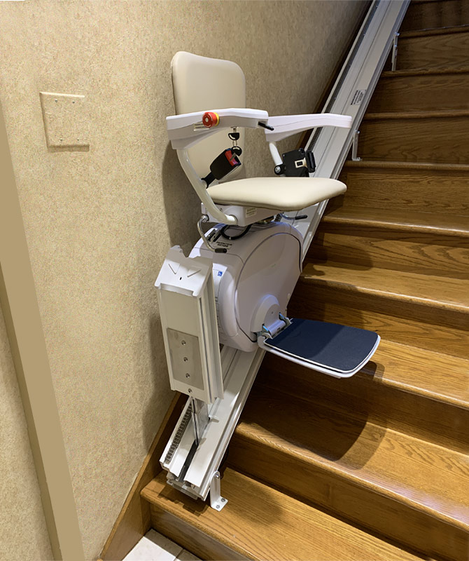 Savaria K2 Plus stairlift install with flip up rail